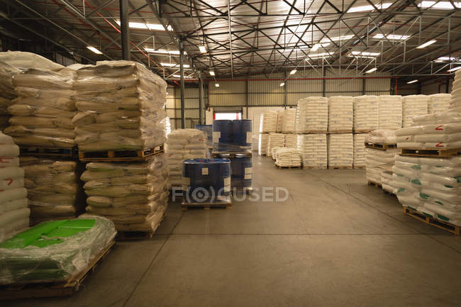 White cements arranged in warehouse — Stock Photo