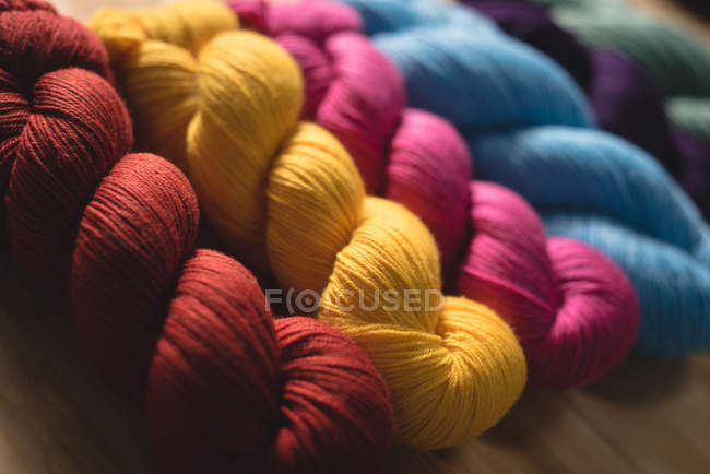 Close-up multicolored  yarn in arranged in row — Stock Photo