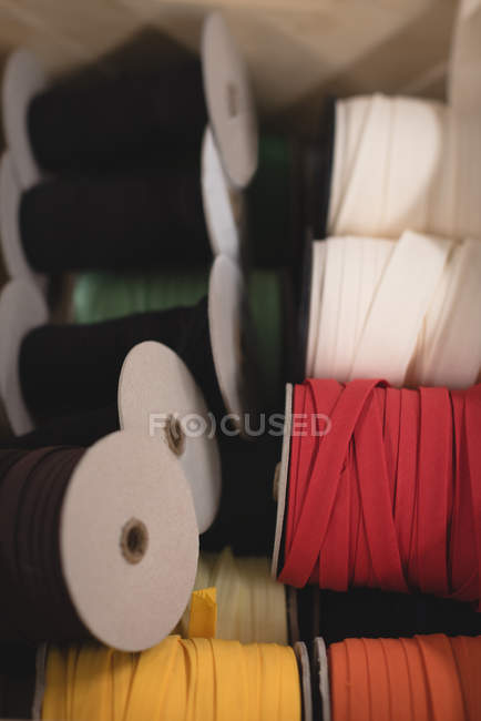 Close-up various reel of thread in tailor shop — Stock Photo
