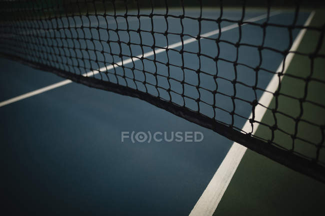 Close-up de rede no campo de ténis ao amanhecer — Fotografia de Stock