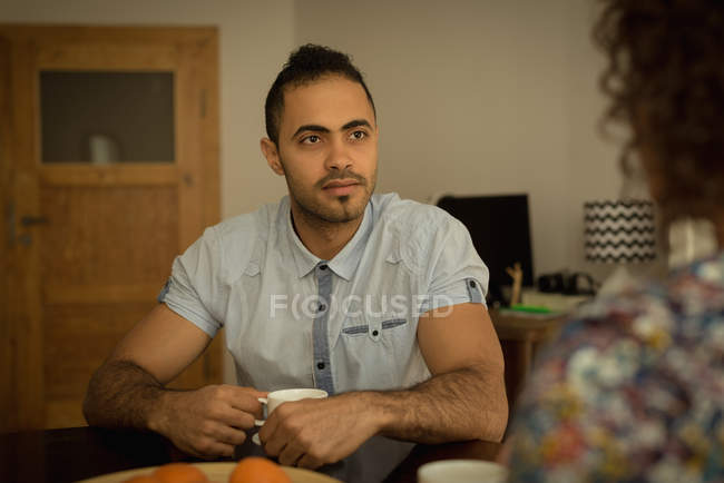 Couple having breakfast together at home — Stock Photo