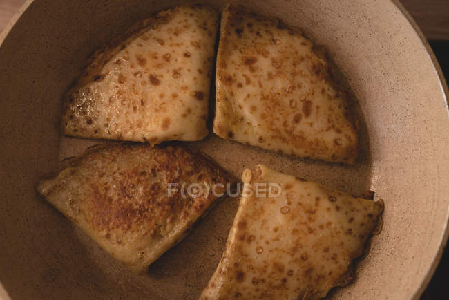 Close-up of sliced pancakes in bowl. — Stock Photo