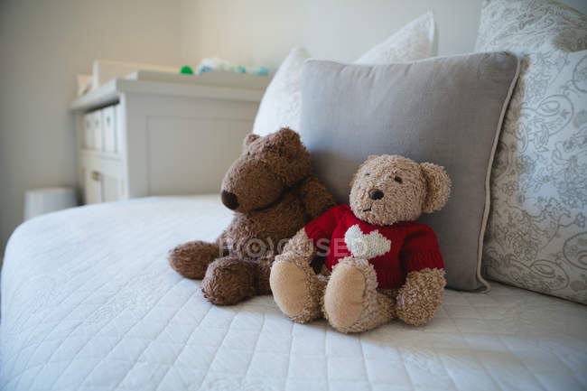 Close-up of soft toys on sofa at home — Stock Photo