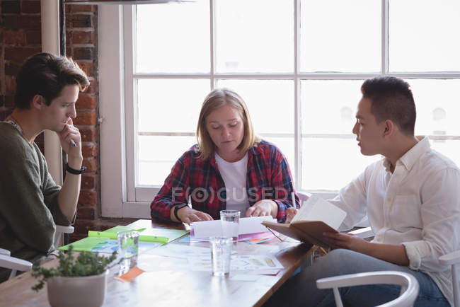 Executives discussing with each other in the creative office — Stock Photo