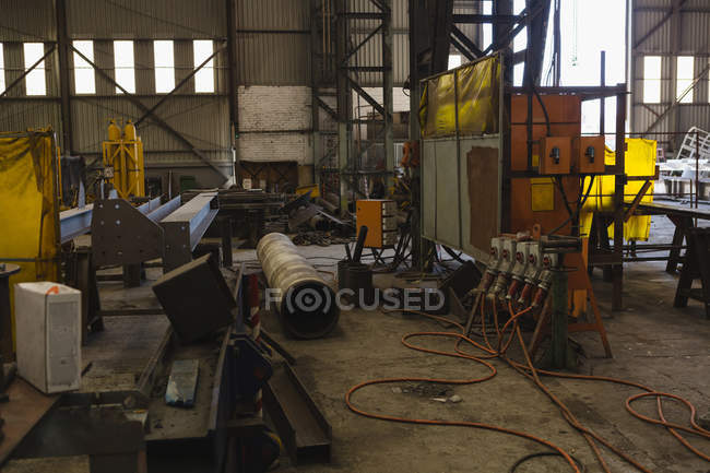 Metal frames and vessel parts for repair in workshop — Stock Photo