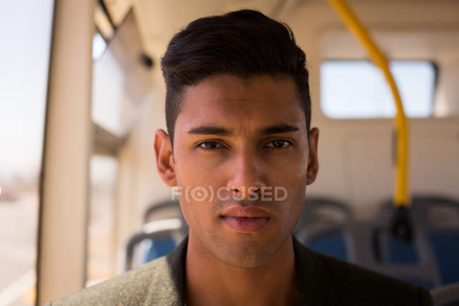 Portrait of businessman travelling in bus — Stock Photo