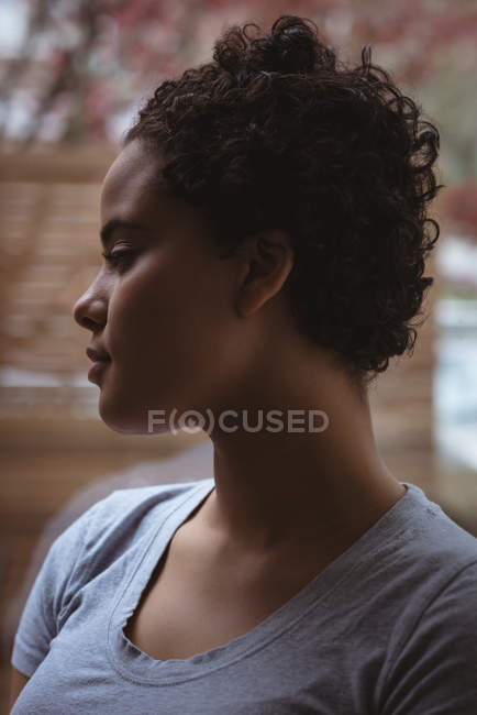 Close up of thoughtful woman at home — Stock Photo