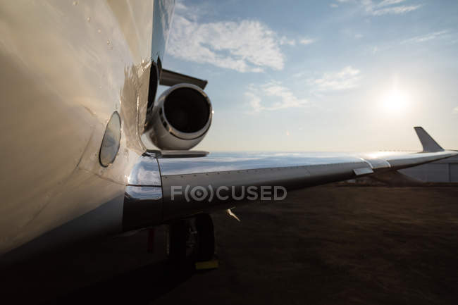 Private jet with part of wing at terminal — Stock Photo