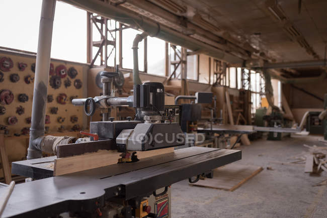 Vintage machine in carpenter workshop — Stock Photo