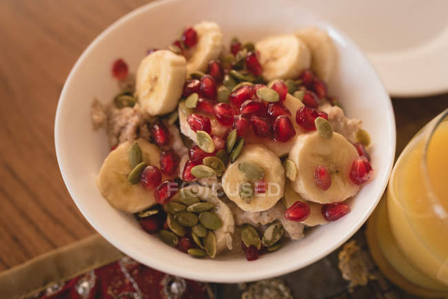 Close-up of healthy breakfast in bowl on table. — Stock Photo