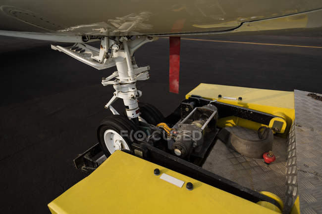 Tyre of private jet on trolley at terminal — Stock Photo