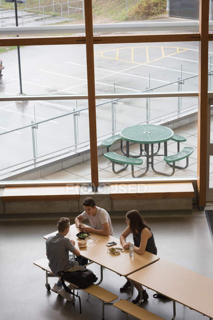 High angle view of university students having lunch — Stock Photo