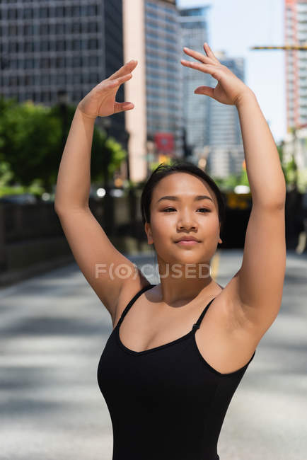 Female ballet dancer dancing on the street — Stock Photo