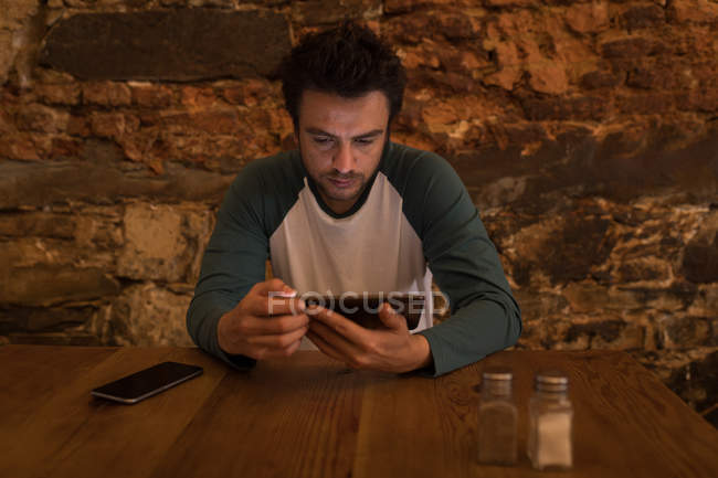 Close up of man using a digital tablet — Stock Photo