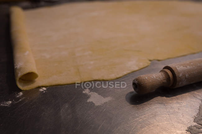Rolled pasta on counter in a bakery — Stock Photo
