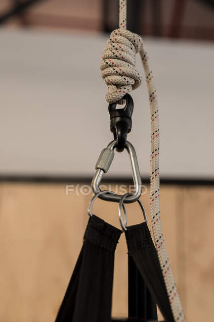 Close up of hook and knot of gym equipment in fitness studio — Stock Photo