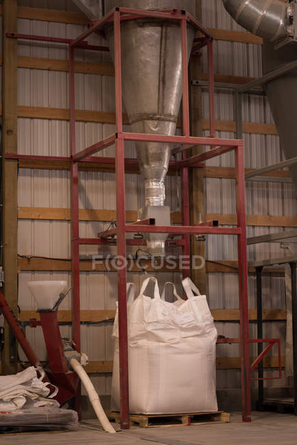 Modern granary machine in warehouse — Stock Photo