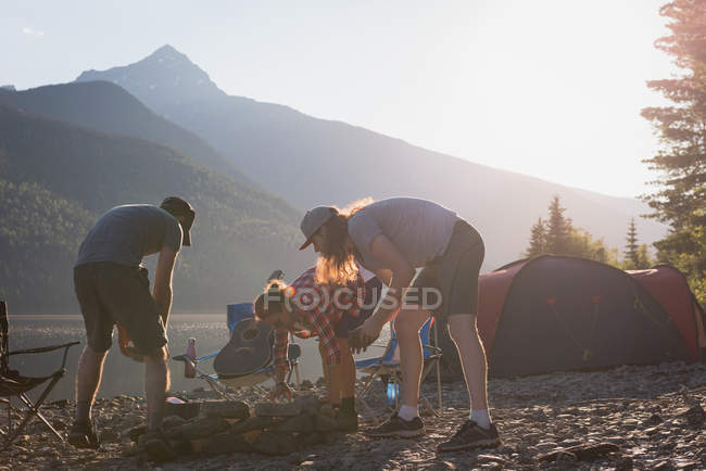 Man making preparation for campfire — Stock Photo