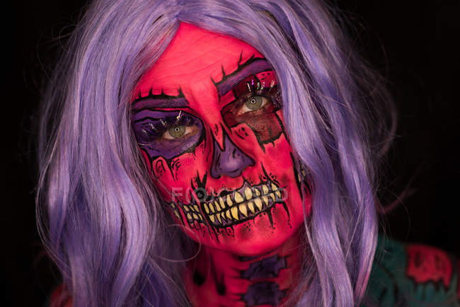 Woman with scary make-up on face for halloween celebration — Stock Photo