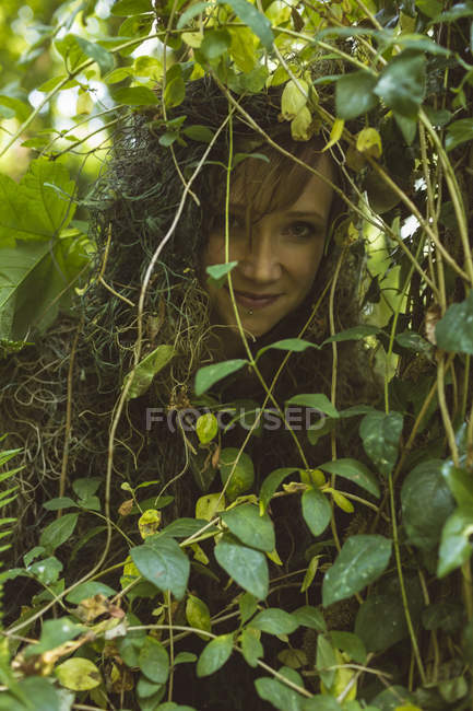 Woman got stuck in bushes — Stock Photo
