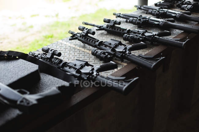Various machine guns arranged in military training — Stock Photo