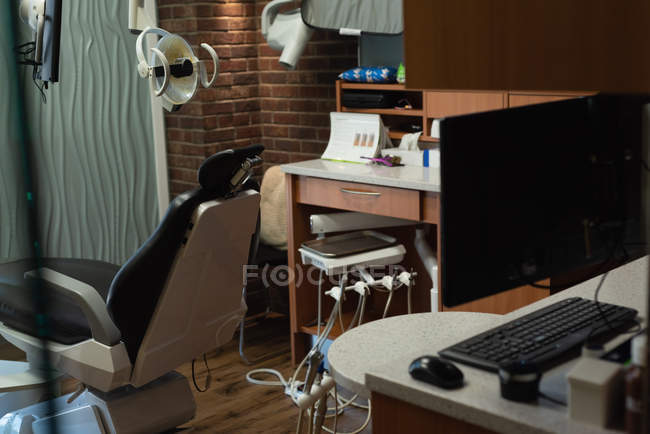 Professional empty dentistry chair in dental clinic — Stock Photo