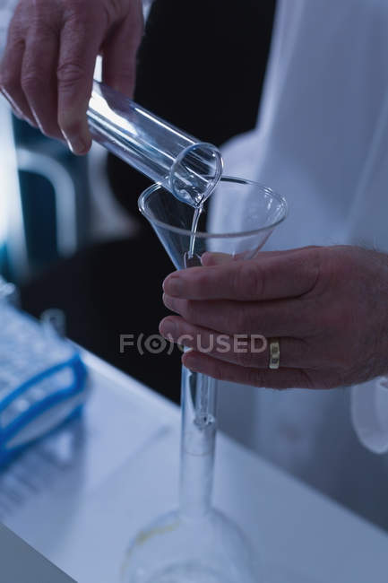 Close-up of male scientist experimenting in laboratory — Stock Photo