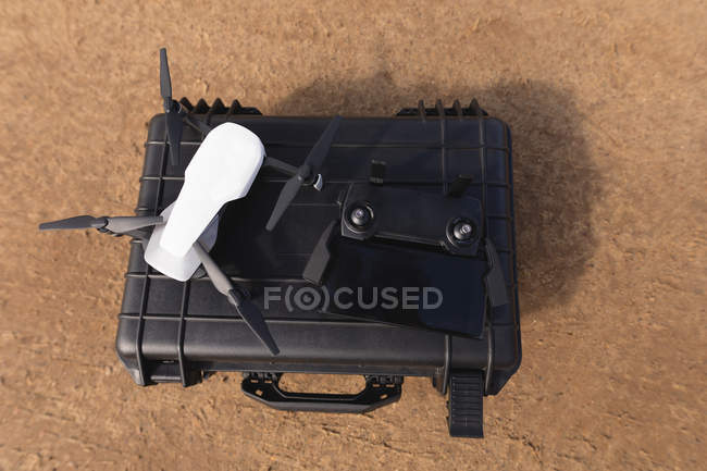 Close-up of drone kept on protector case — Stock Photo