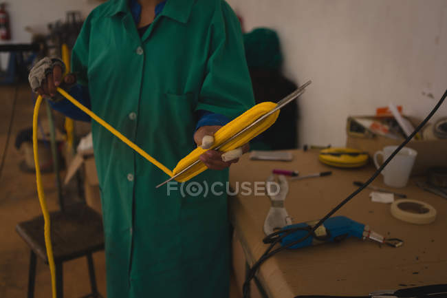 Mid section of worker working in rope making industry — Stock Photo