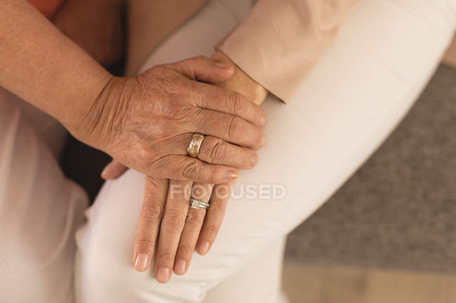 Close-up of mother consoling her daughter at home — Stock Photo