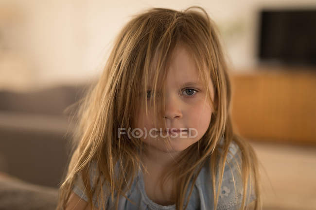 Portrait of girl in living room at home — Stock Photo