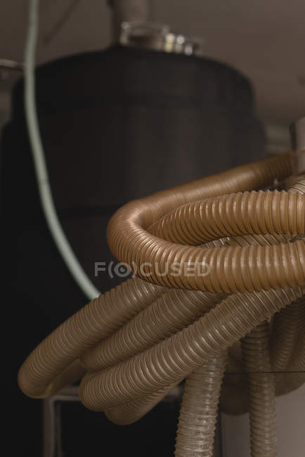 Close-up of distillery tank and pipe in factory — Stock Photo