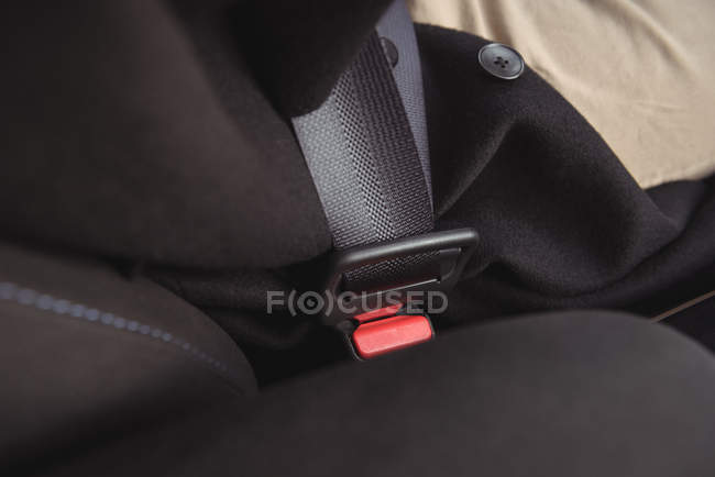 Close-up of black seat belt holder in car — Stock Photo