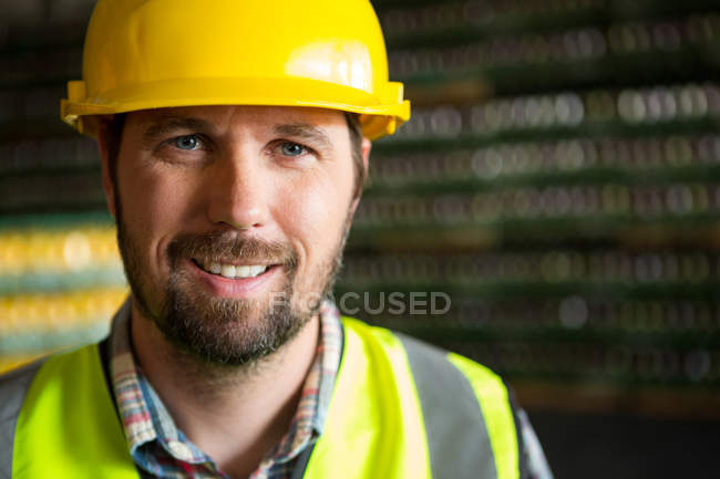 Close up portrait of worker in factory — Stock Photo