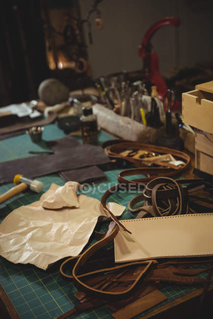 Various work tools on table in workshop — Stock Photo