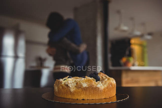 Blueberry cake on table in living room at home — Stock Photo
