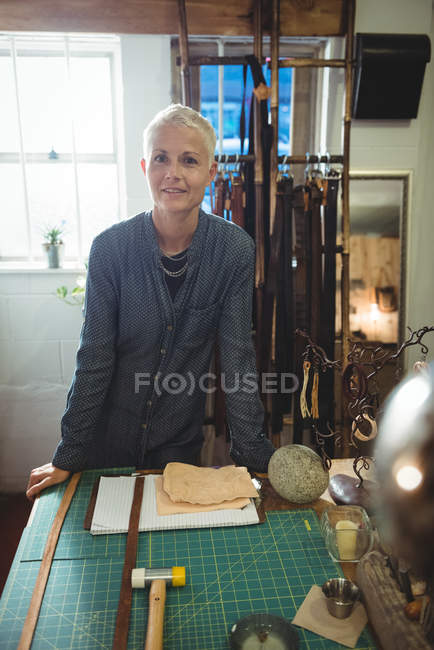 Portrait of confidence craftswoman standing in workshop — Stock Photo