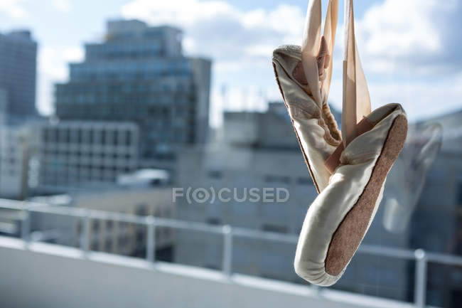 Pair of ballet shoes in the ballet studio — Stock Photo