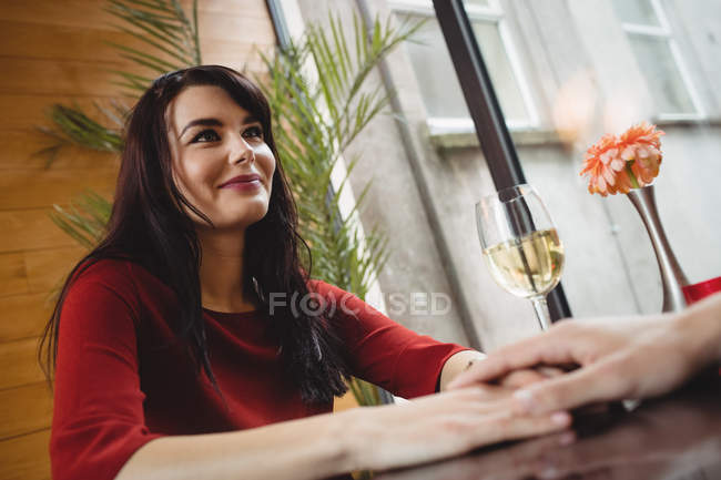 Couple having champagne together in bar — Stock Photo