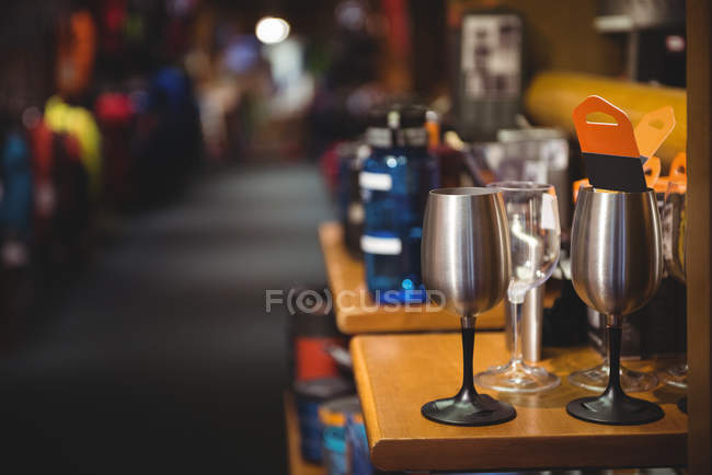 Close-up of metallic wine glasses in shop — Stock Photo