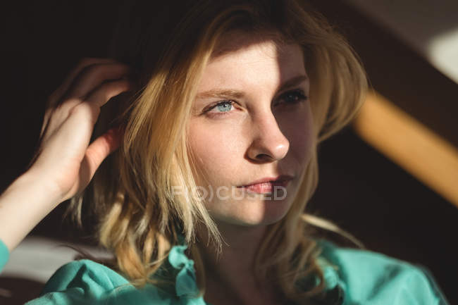 Close-up of thoughtful woman at home — Stock Photo