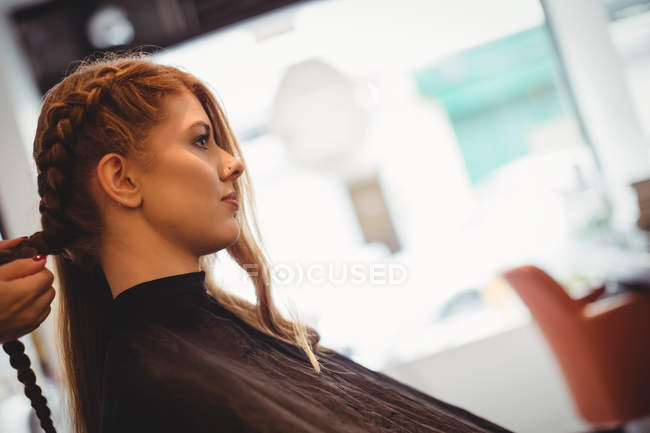 Close-up of woman in hair salon — Stock Photo