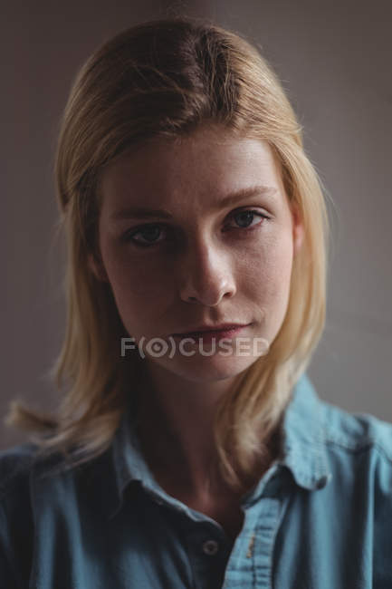 Portrait of beautiful woman at home — Stock Photo
