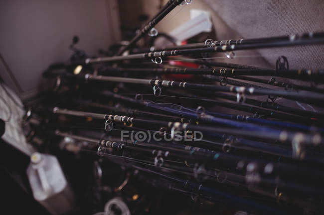Close-up of fishing rods in fishing boat — Stock Photo