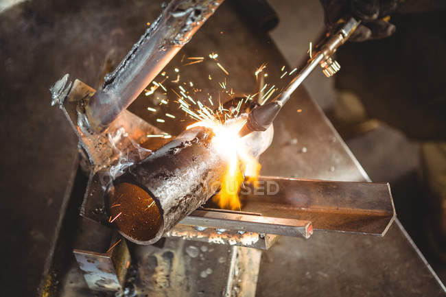 Sparks during metal welding in workshop — Stock Photo