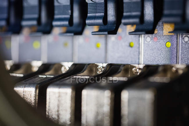 Close-up of rack mounted server in server room — Stock Photo