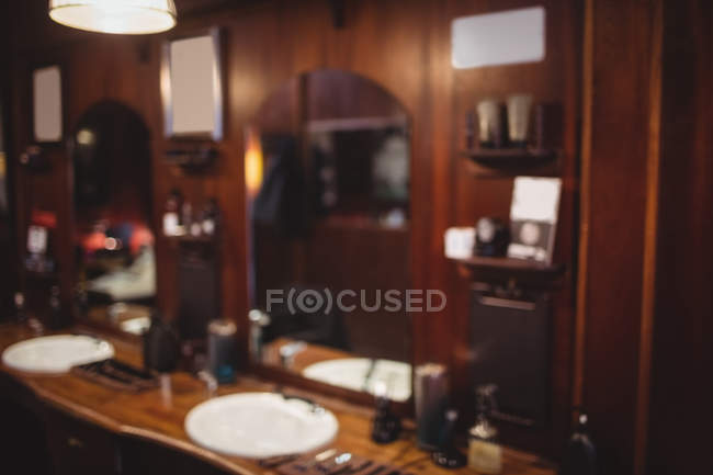Blurry interior of barber shop — Stock Photo
