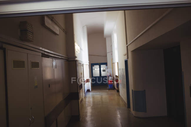 Empty long corridor at hospital interior — Stock Photo