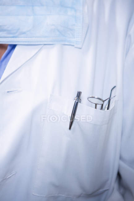 Close-up of tools in dentist's pocket — Stock Photo