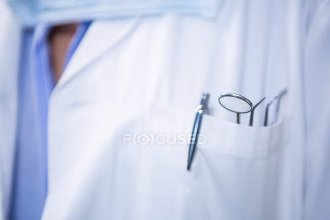 Close-up of tools in dentist's pocket — Stock Photo
